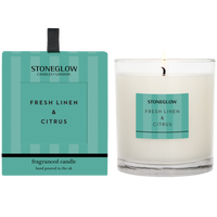 Stoneglow Fresh Linen & Citrus candle and packaging on a white background