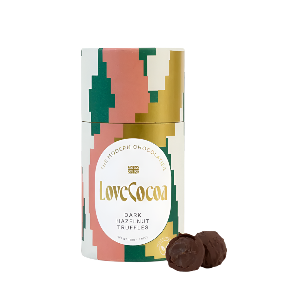 LoveCocoa dark hazelnut truffles packaging with two truffles on a white background