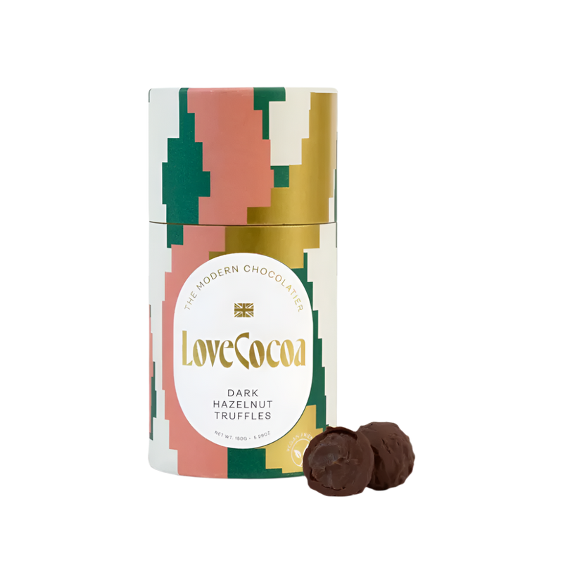 LoveCocoa dark hazelnut truffles packaging with two truffles on a white background