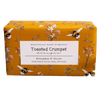 Bar of soap with 'Toasted Crumpet' packaging featuring floral and bee design on a white background.