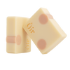 Two bars of hand and body soap with a delicate pattern on a white background, featuring the brand name 'Oir'.