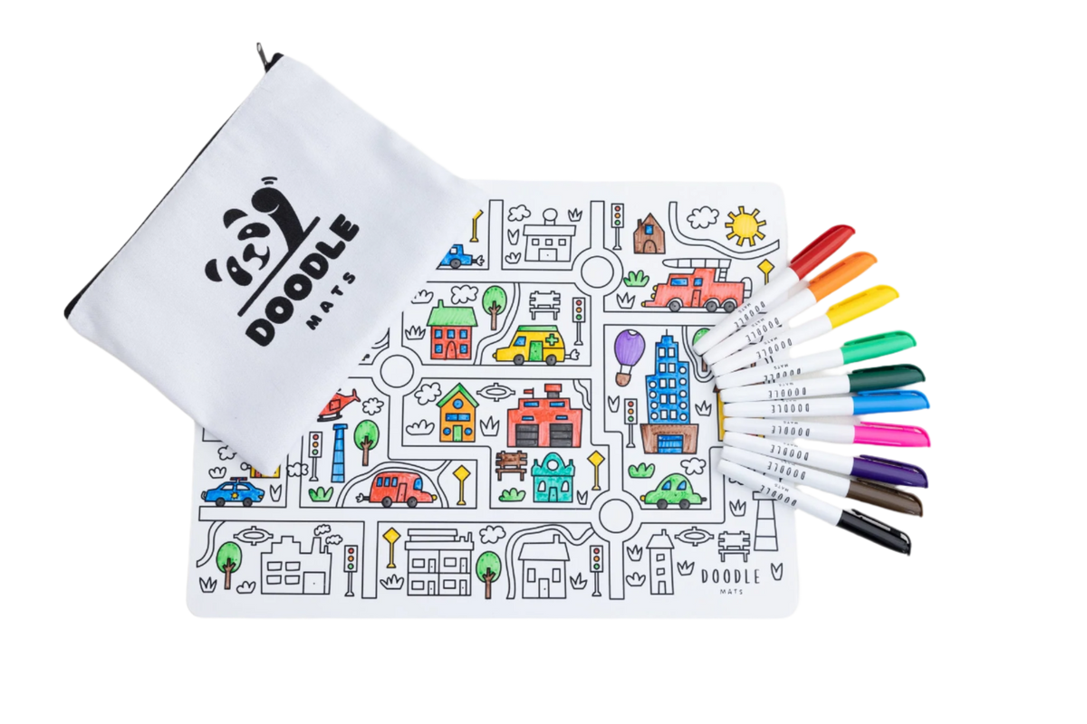 Coloring mat with doodles and markers on a white background