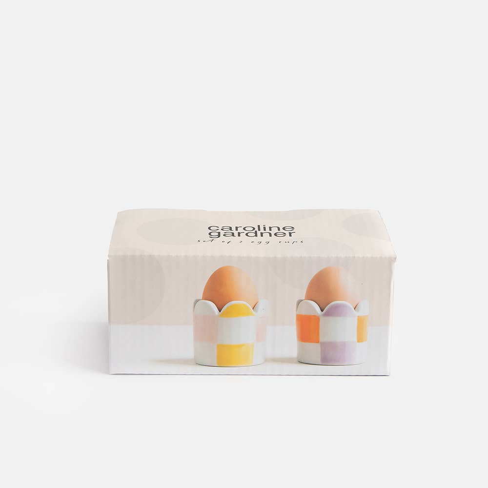 Caroline Gardner product packaging with two eggs on a white background