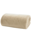Rolled beige throw on a white background