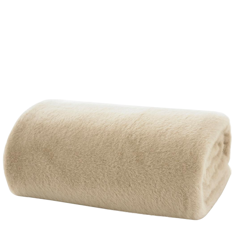 Rolled beige throw on a white background