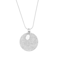 Silver necklace with a round pendant on a white background