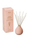 Aery Aztec Tuberose diffuser with packaging on a white background