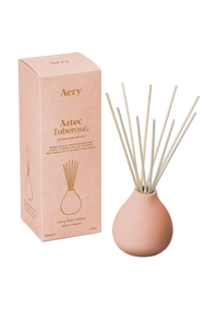 Aery Aztec Tuberose diffuser with packaging on a white background