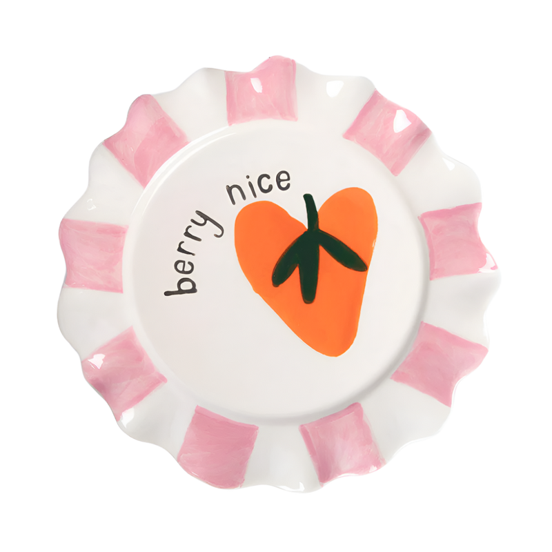 Decorative plate with strawberry design and text on a white background