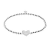 Silver bracelet with a heart-shaped charm on a white background