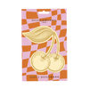 Packaged brass bookmark with cherry design on a checkered background