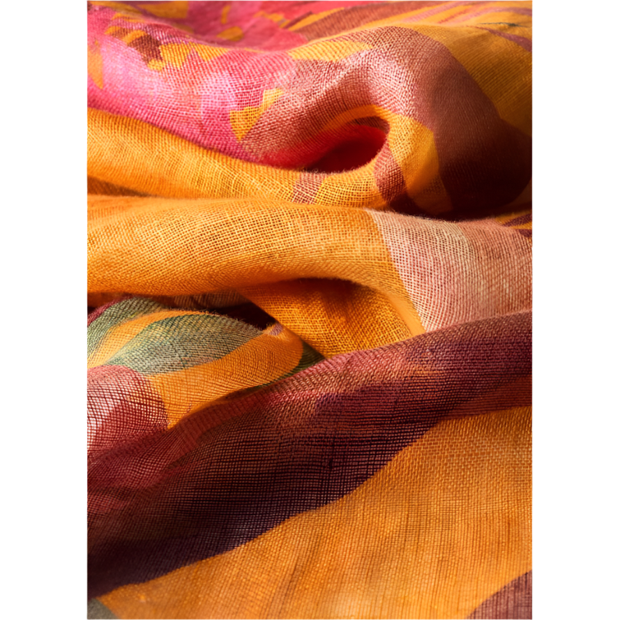 Close-up of colorful fabric with a patterned design.