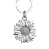 Silver daisy flower keychain on a white background