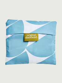 Blue and white patterned product with 'original duckhead' label on a beige background