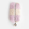 Pastel-colored fluffy pouch with a zipper on a white background