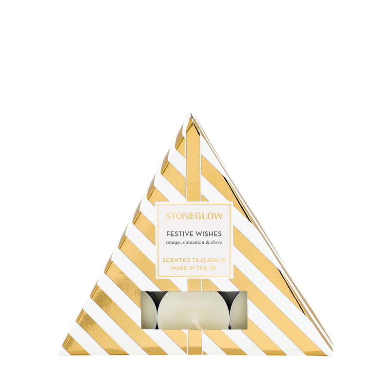 Triangular gift box with gold and white stripes containing a candle, branded 'Stoneglow'.