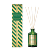 Green diffuser bottle with reeds and striped packaging on a white background