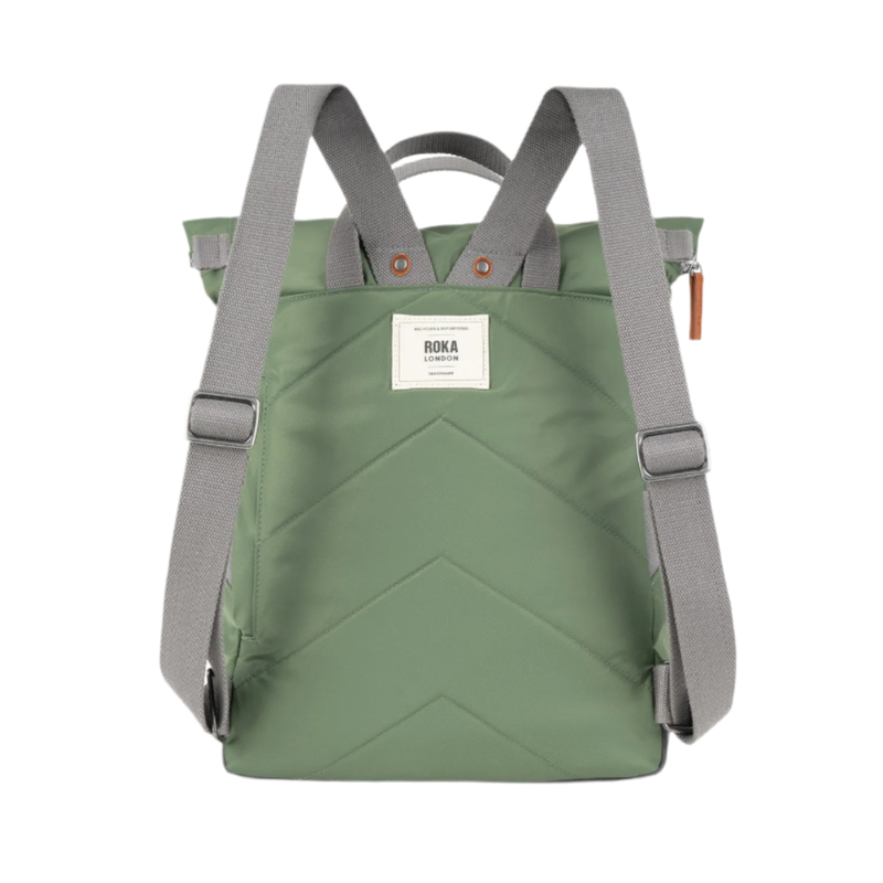 Green roka backpack with gray straps on a white background