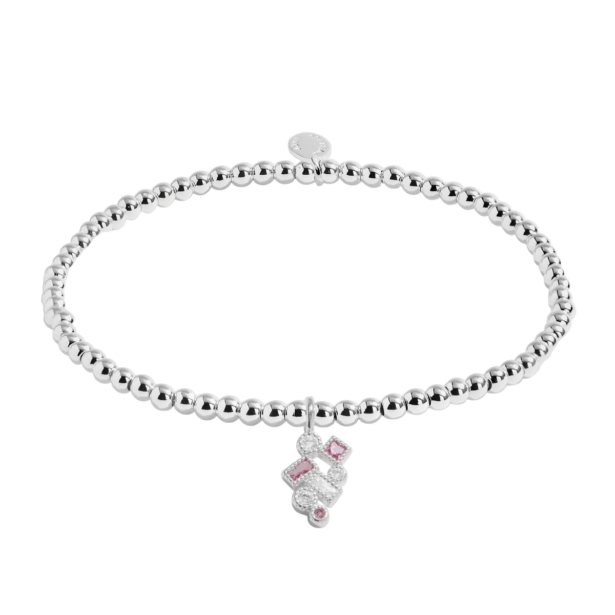 Silver bracelet with a pink heart charm on a white background