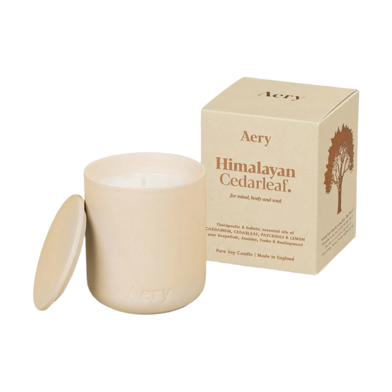 Aery Himalayan Cedarleaf candle and packaging on a white background