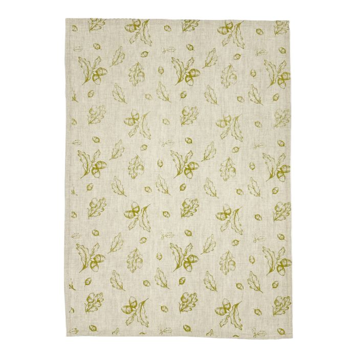 Beige fabric with small green floral pattern on a white background