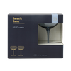 Boxed set of 'The Lou Coupe Glasses' by 'here's how' on a white background