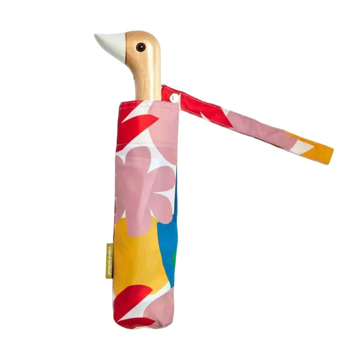 a colourful umbrella with a duckhead handle by original duckhead on a plain background
