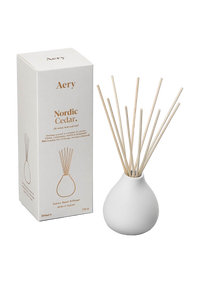 Aery Nordic Cedar diffuser with packaging on a white background