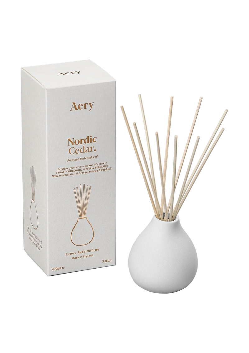 Aery Nordic Cedar diffuser with packaging on a white background