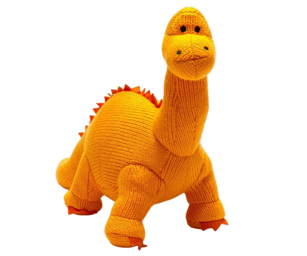Knitted dinosaur toy in orange on a white background
