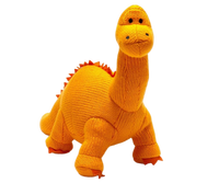 Knitted dinosaur toy in orange on a white background