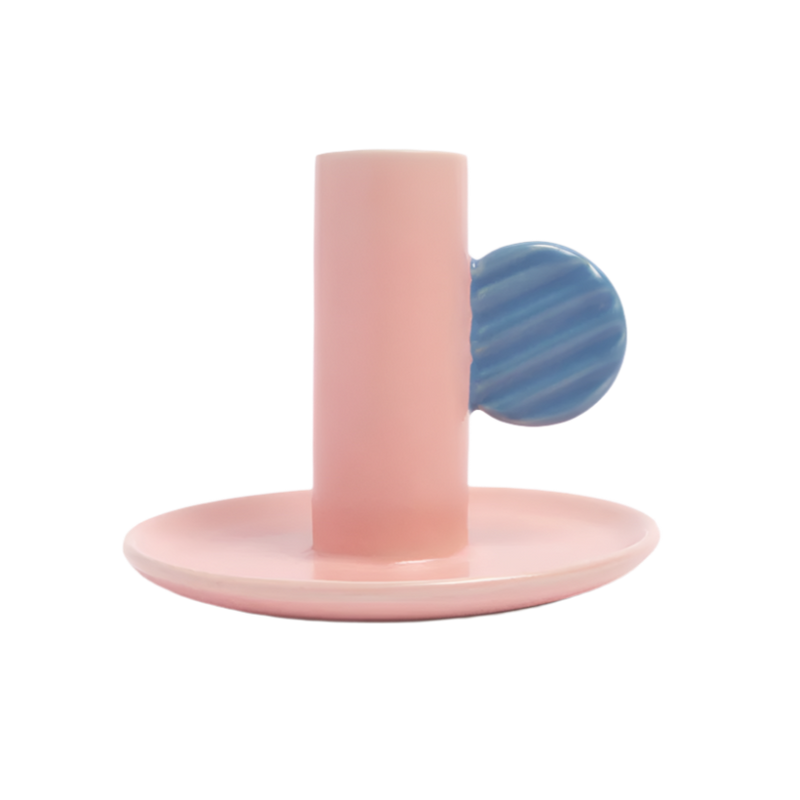 Pink and blue ceramic candlestick holder on a white background