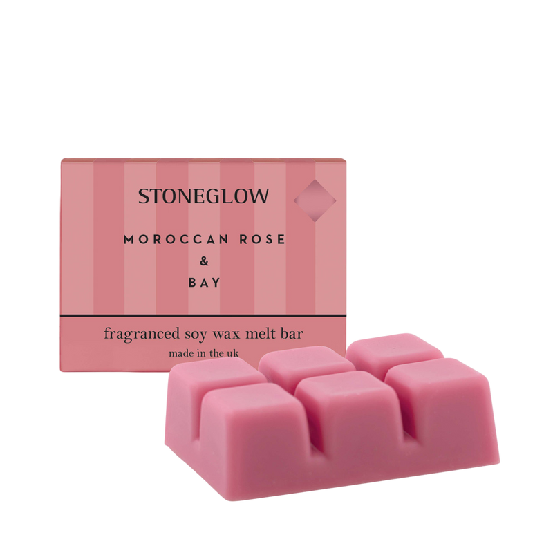 Pink stoneglow Moroccan Rose & Bay scented wax melt bar with packaging on a white background