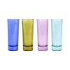 Four colorful glass shot glasses.