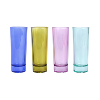 Four colorful glass shot glasses.