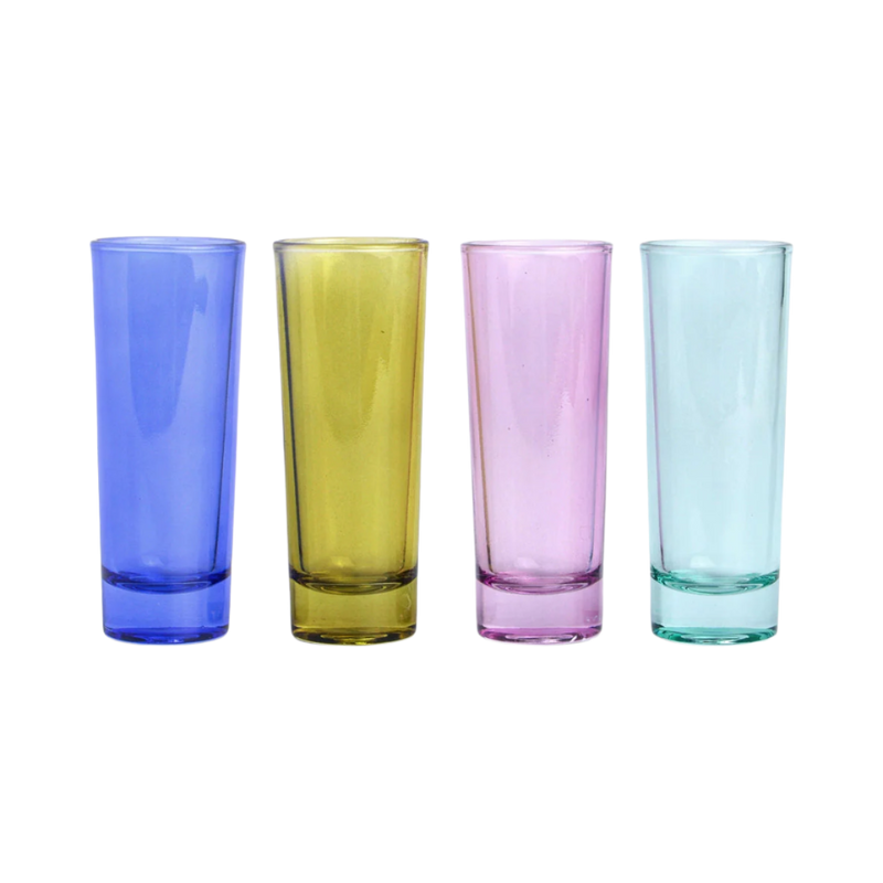 Four colorful glass shot glasses.
