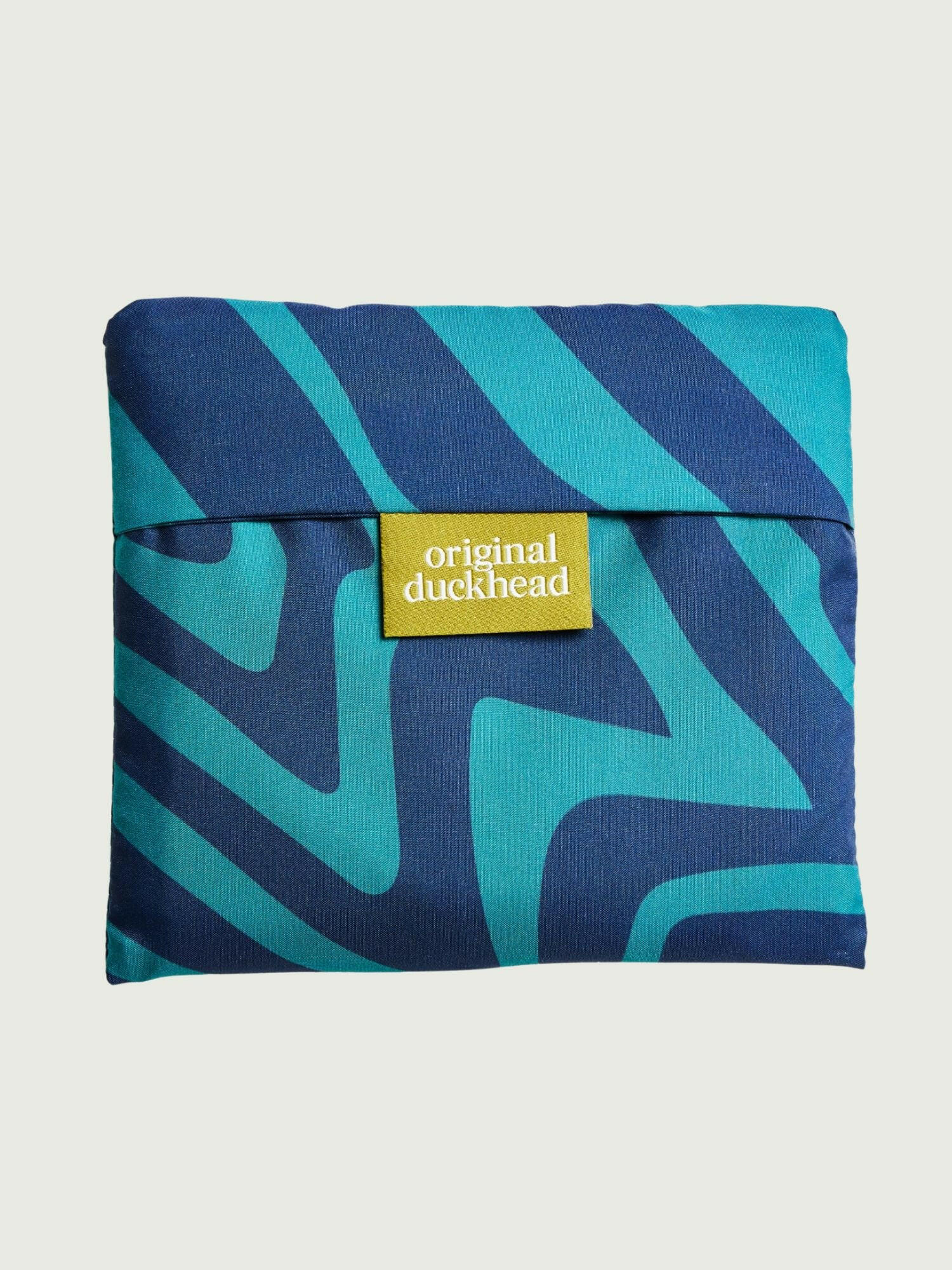Blue and green patterned pouch with 'original duckhead' label on a white background