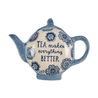 Ceramic teapot teabag dish with floral design and 'TEA makes everything BETTER' text on a white background