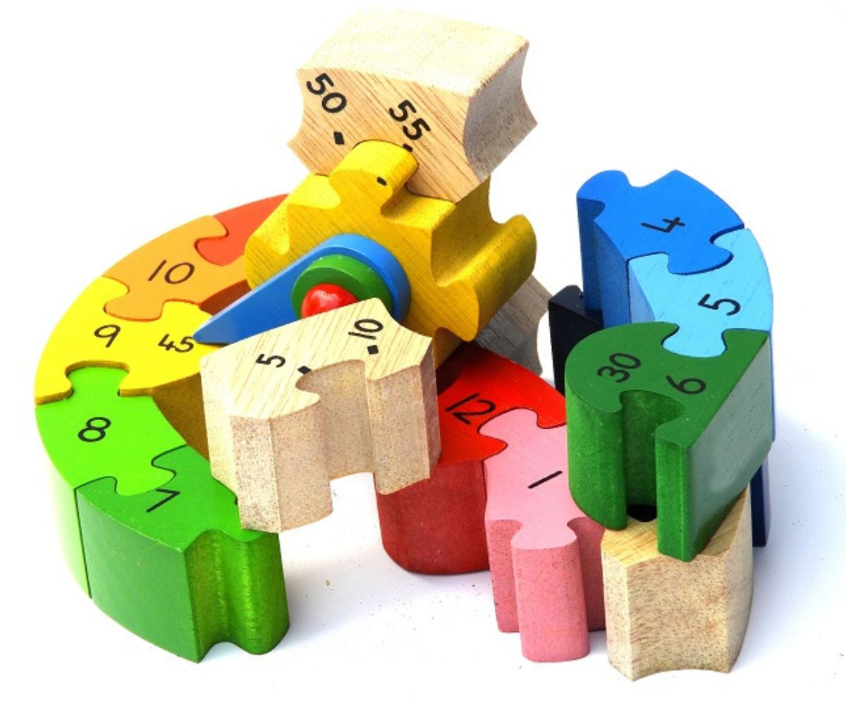 Colorful wooden number puzzle toy on a white background