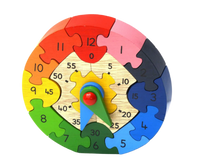 Colorful wooden puzzle clock with gears on a white background