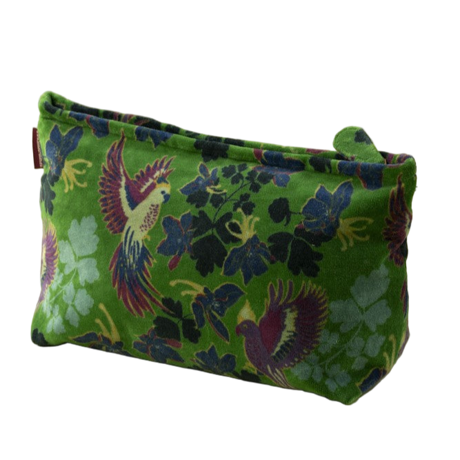 Green fabric pouch with floral and bird pattern on a yellow background
