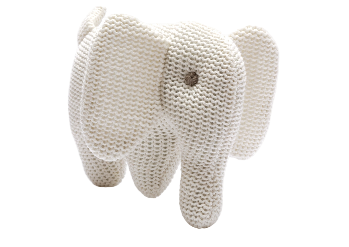 Knitted elephant toy on a white background
