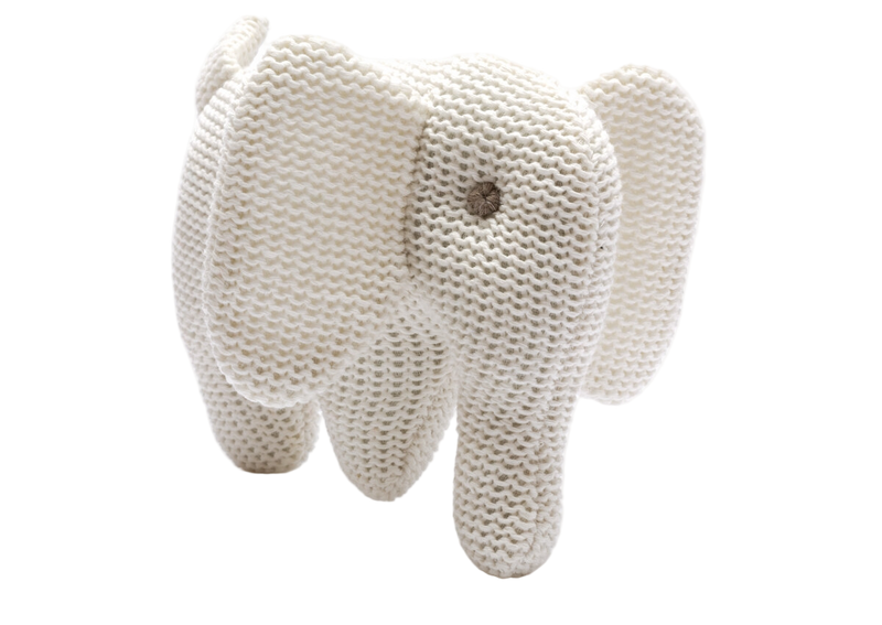 Knitted elephant toy on a white background