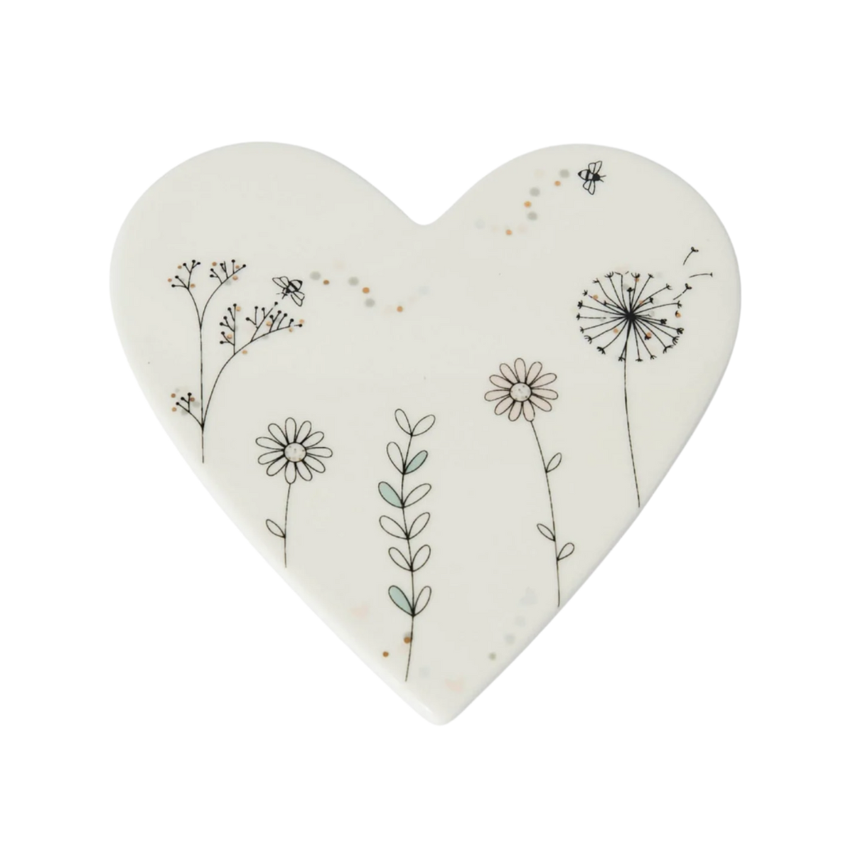 Heart-shaped ceramic plate with floral designs on a white background