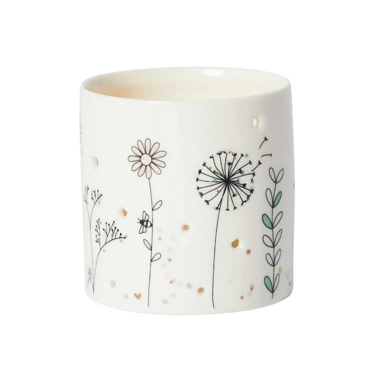 White candle holder with floral designs on a white background